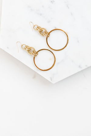 Find the perfect pair of earrings you're looking for from Charme Silkiner! These 24k gold textured chain drop earrings are seriously stunning. Perfect to dress or dress down any outfit the Dusk Earrings are the perfect must have for everyone!