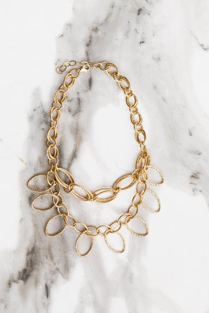 Find the perfect necklace you're looking for from Charme Silkiner! This beautiful 24K Gold + Diamond Overlay Cut Chain Necklace is seriously chic. Great for layering or wearing alone the Rianna Necklace is the perfect piece of unique jewelry that everyone should own to make a statement!