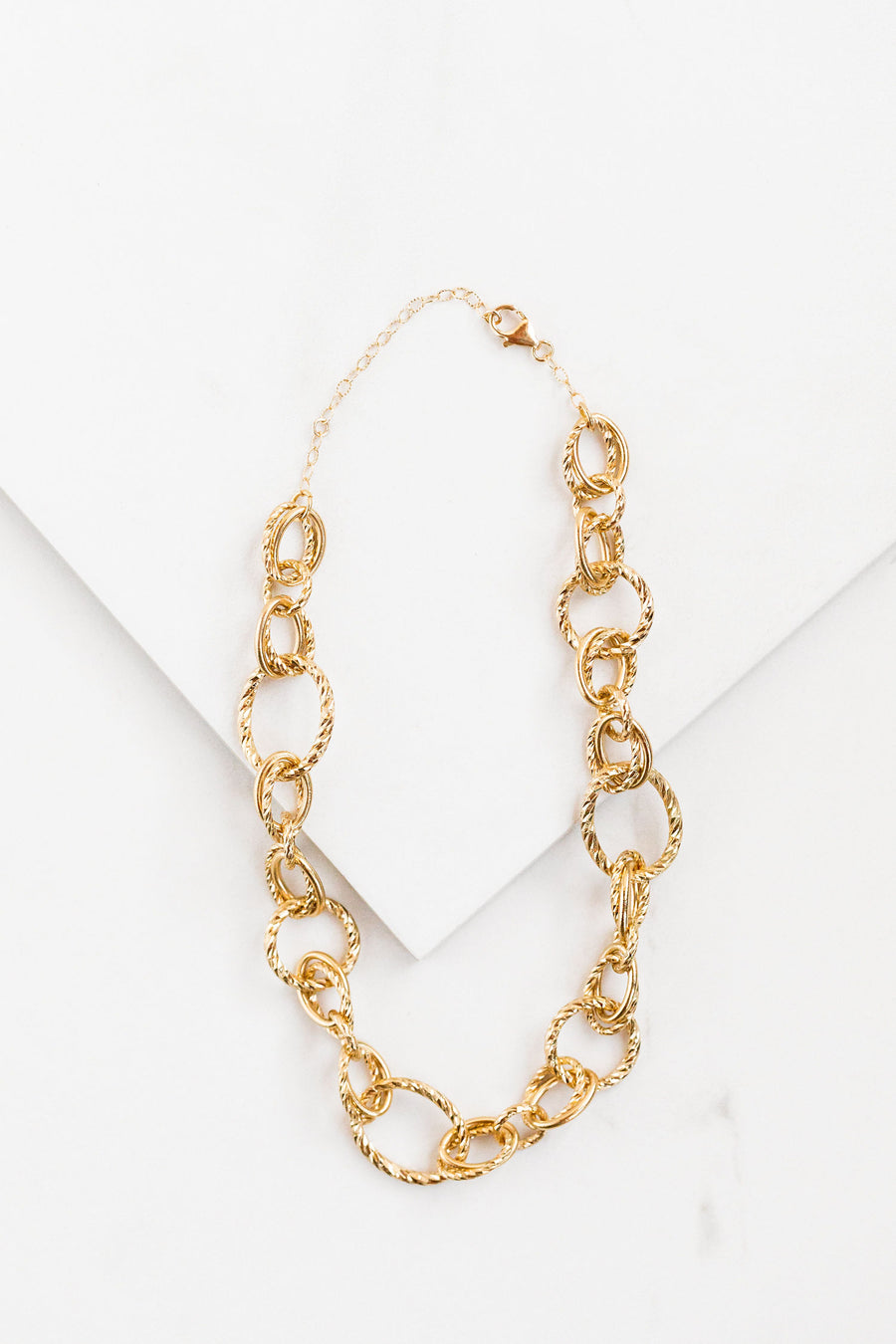 Find the perfect necklace you're looking for from Charme Silkiner! This beautiful 24k gold overlay with diamond cut chain necklace is simple yet perfect. Great for layering or wearing alone the Guiliana Necklace is the perfect piece of unique jewelry that everyone should own.