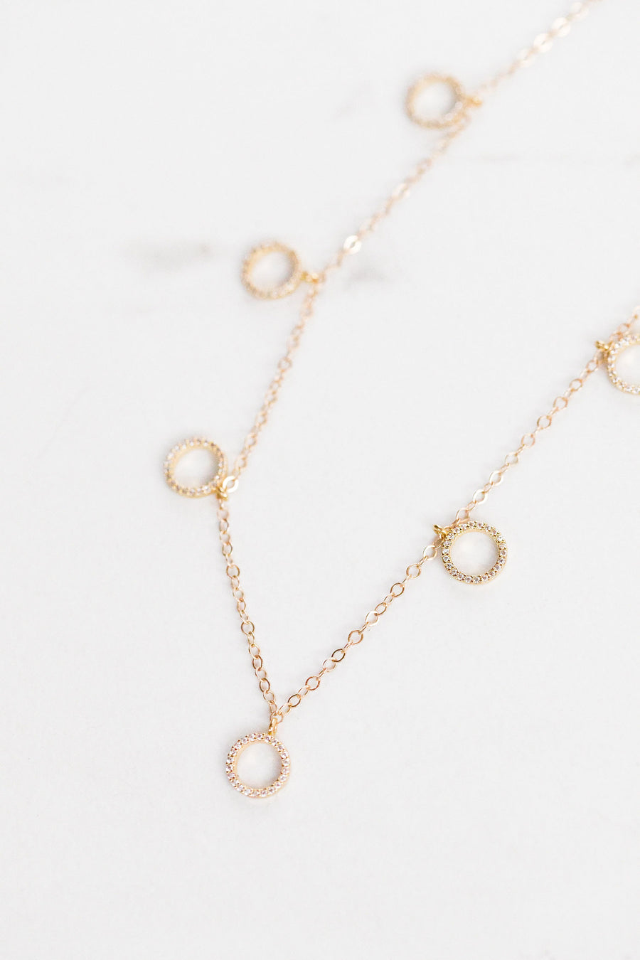 Find the perfect necklace you're looking for from Charme Silkiner! This beautiful 14K Gold Chain Necklace with Halo CZ accents is sheer perfection. Great for layering or wearing alone the Awake Necklace is the perfect piece of unique jewelry that everyone should own. 