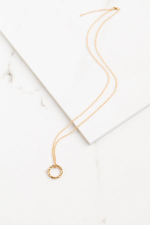 Find the perfect necklace you're looking for from Charme Silkiner! This beautiful 14K Gold Chain Necklace with a diamond cut circle is pure perfection. Great for layering or wearing alone the Ketan Necklace is the perfect piece of unique jewelry that everyone should own.