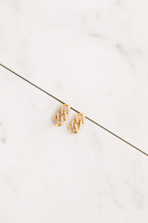 Find the perfect pair of earrings you're looking for from Charme Silkiner! These 14k gold + CZ pave chain earrings are seriously stunning. Perfect to dress or dress down any outfit the Nest Earrings are the perfect must have for everyone!