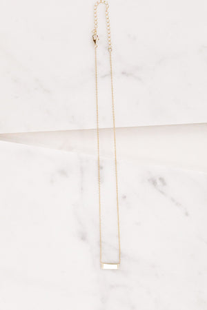 Find the perfect necklace you're looking for from Charme Silkiner! This beautiful 14K Gold Plated Necklace with a cz detailed gold bar is pure perfection. Great for layering or wearing alone the Ima Necklace is the perfect piece of unique jewelry that everyone should own. 