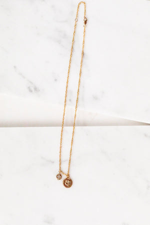 Find the perfect necklace you're looking for from Charme Silkiner! This beautiful 22k Gold Chain Necklace with cz accents and rose gold charm is seriously perfection. Great for layering or wearing alone the Reva Necklace is the perfect piece of unique jewelry that everyone should own.
